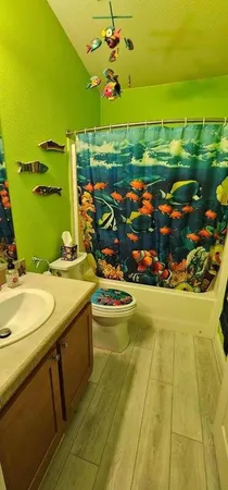 a view of a swimming pool with an outdoor seating