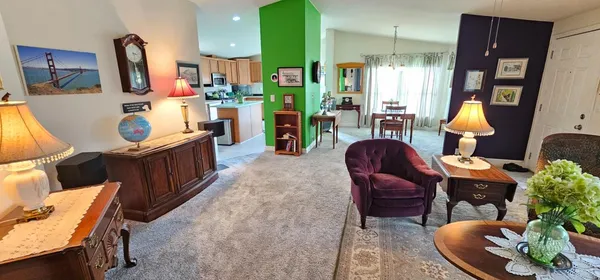 a living room filled with furniture and a couch