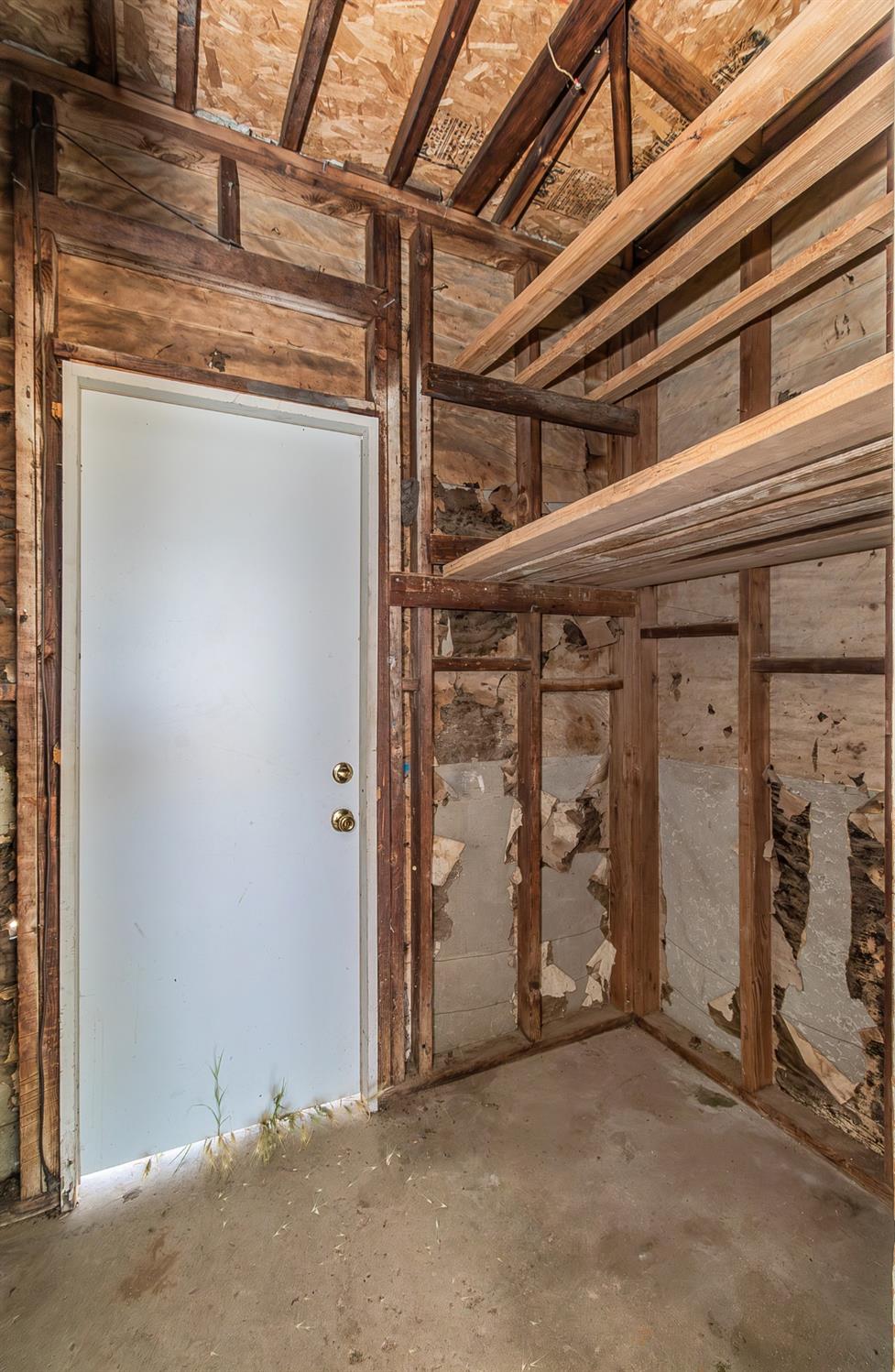 902 Music Avenue Clovis, CA 93612 - Photo 20 of 21 a view of a room with wooden walls