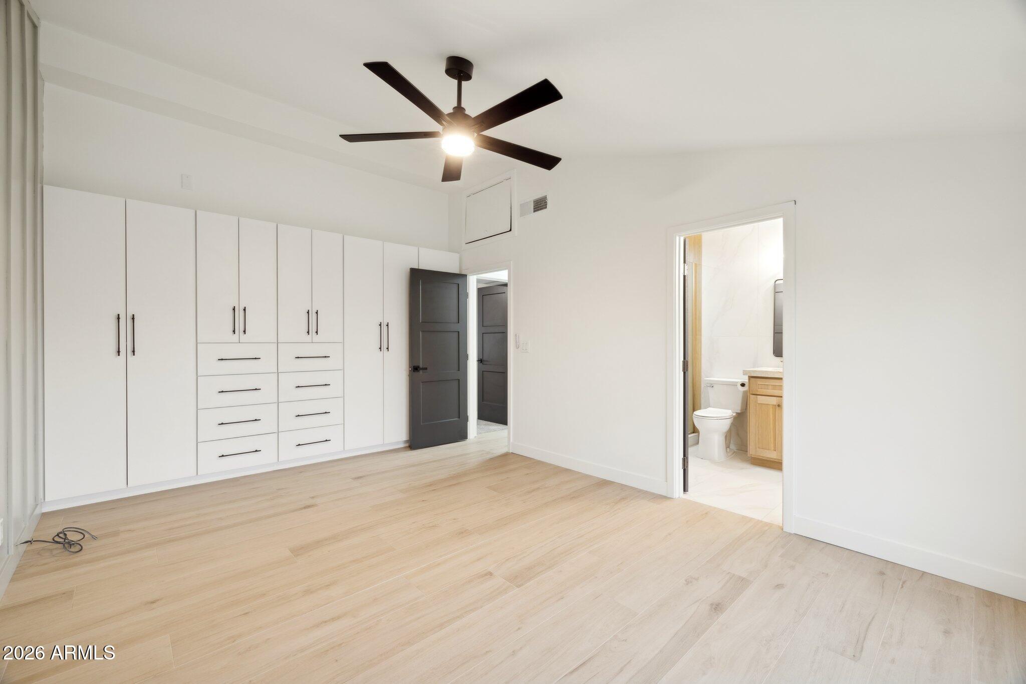 1216 West Rovey Avenue Phoenix, AZ 85013 - Photo 16 of 45 a view of a livingroom with a ceiling fan