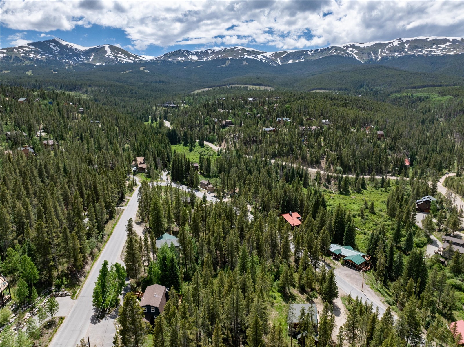 384 Blue Ridge Road Breckenridge, CO 80424 - Photo 14 of 39 a view of a city with lush green forest