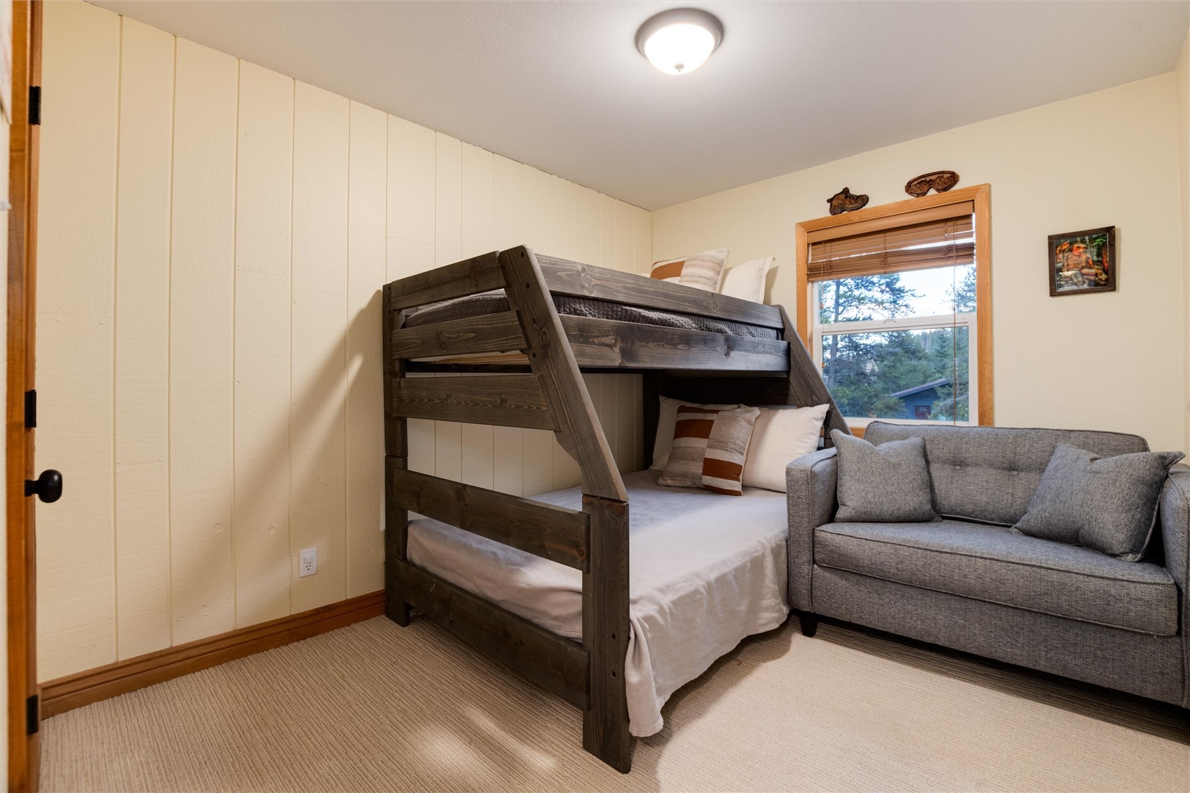 384 Blue Ridge Road Breckenridge, CO 80424 - Photo 20 of 39 a bedroom with a bed and a couch