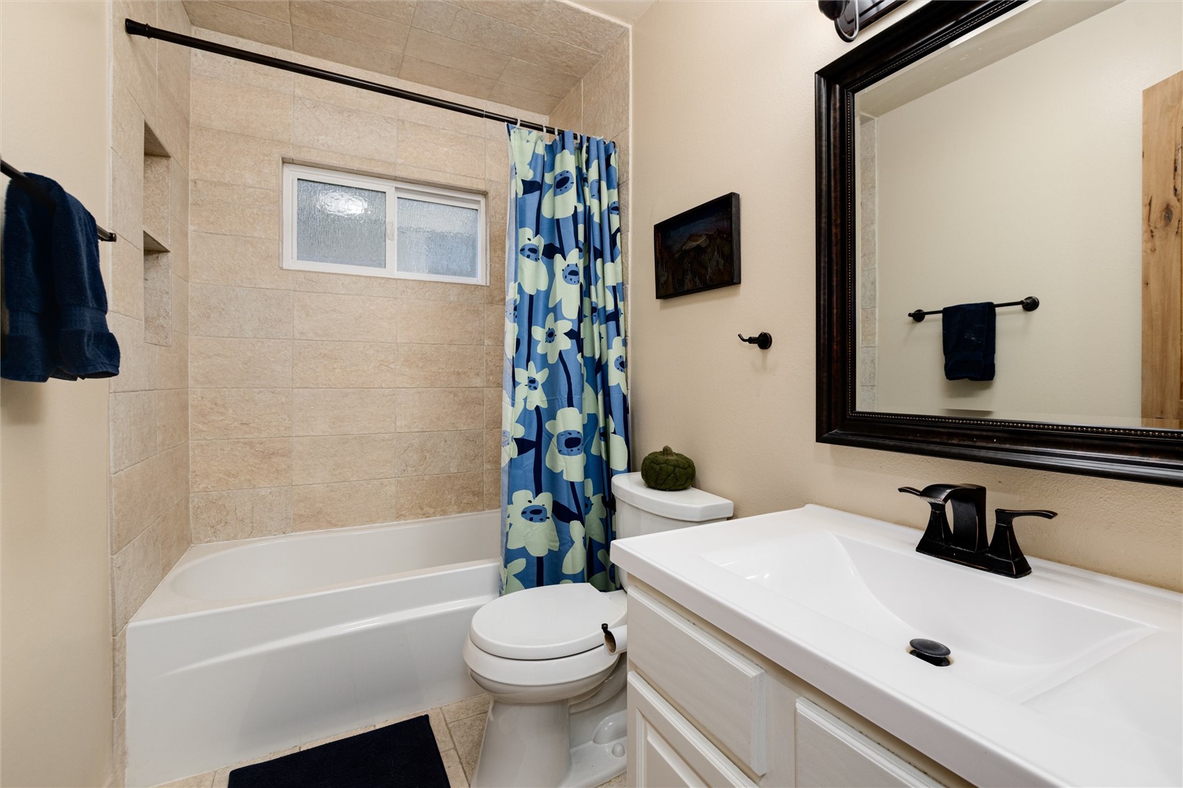 384 Blue Ridge Road Breckenridge, CO 80424 - Photo 22 of 39 a bathroom with a sink a toilet a mirror and shower