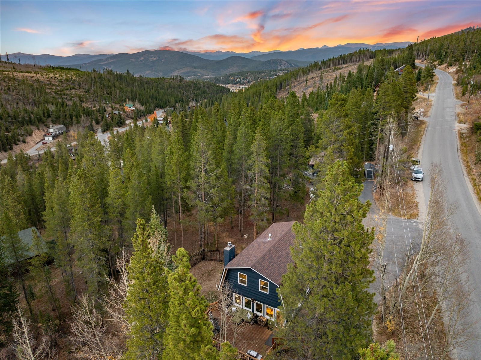 384 Blue Ridge Road Breckenridge, CO 80424 - Photo 26 of 39 a view of a lush green hillside and houses