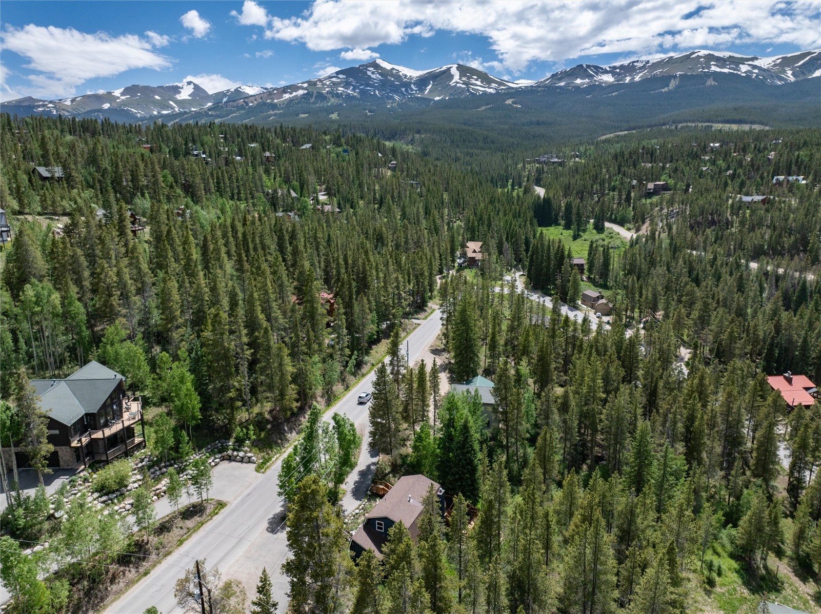 384 Blue Ridge Road Breckenridge, CO 80424 - Photo 38 of 39 a view of a lake with a mountain in the background