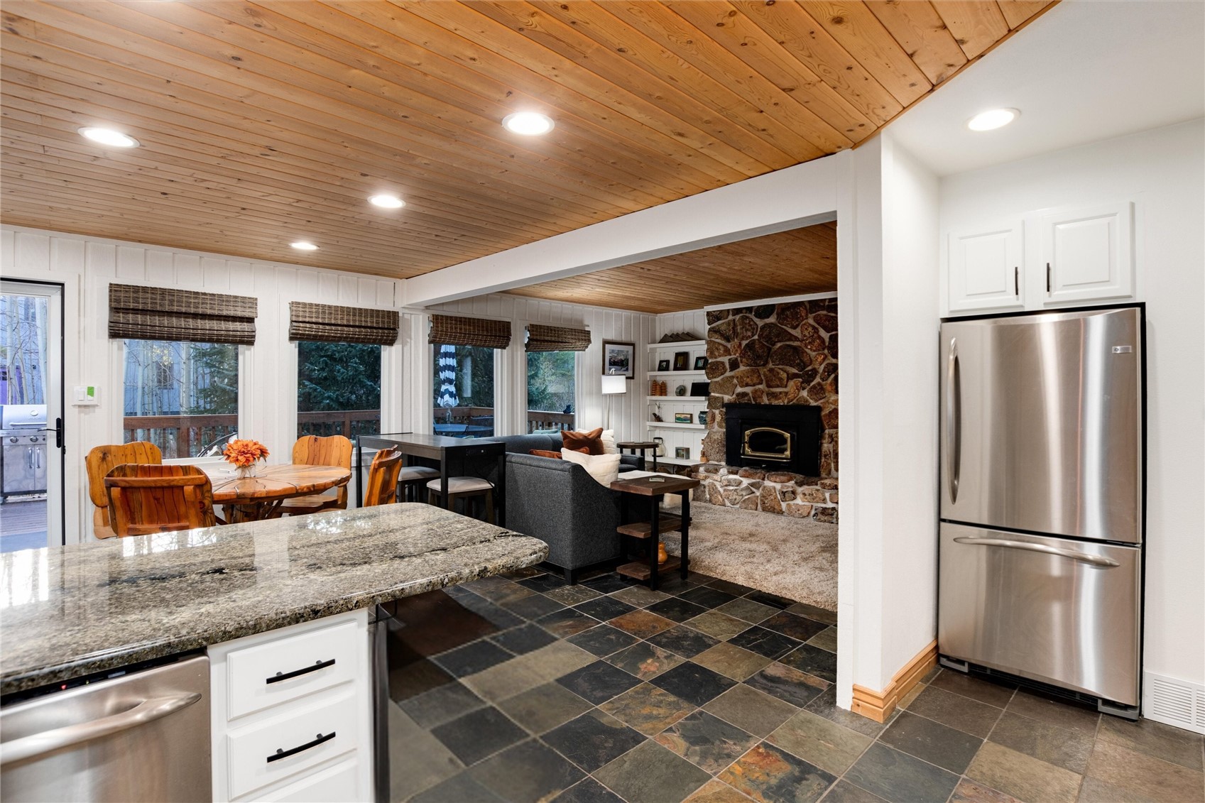 384 Blue Ridge Road Breckenridge, CO 80424 - Photo 5 of 39 a kitchen with refrigerator and cabinets