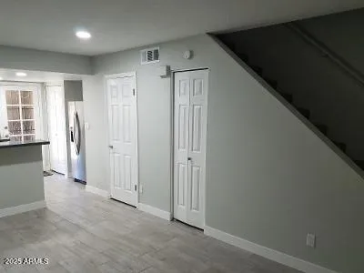 an empty room with windows