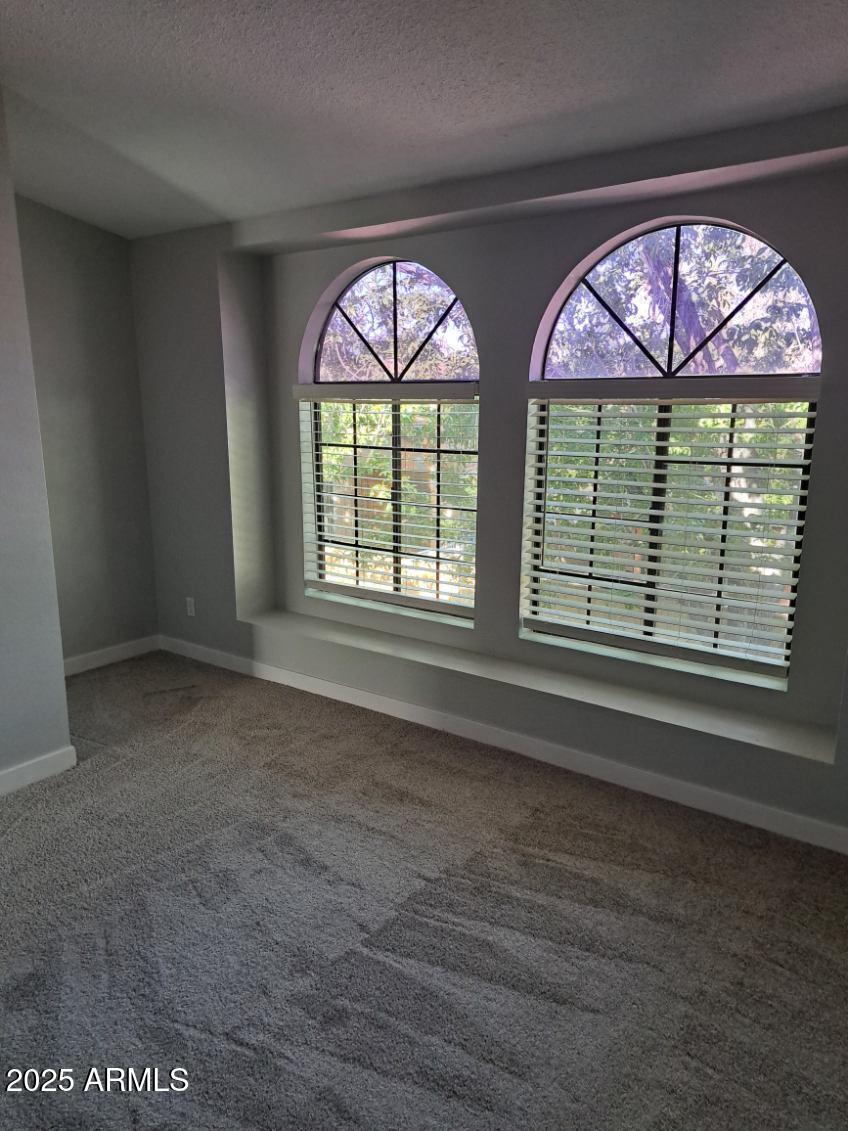 3719 East Inverness Avenue, Unit 91 Mesa, AZ 85206 - Photo 19 of 28 wooden floor with a window