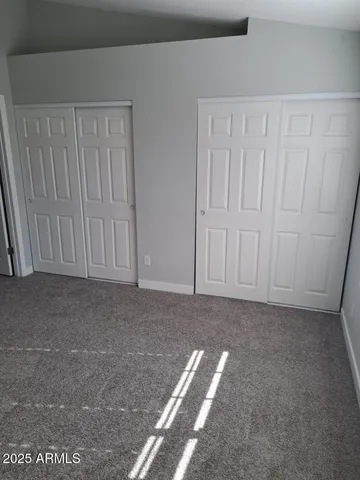 a swimming pool with outdoor seating