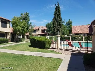 a view of a house with a swimming pool
