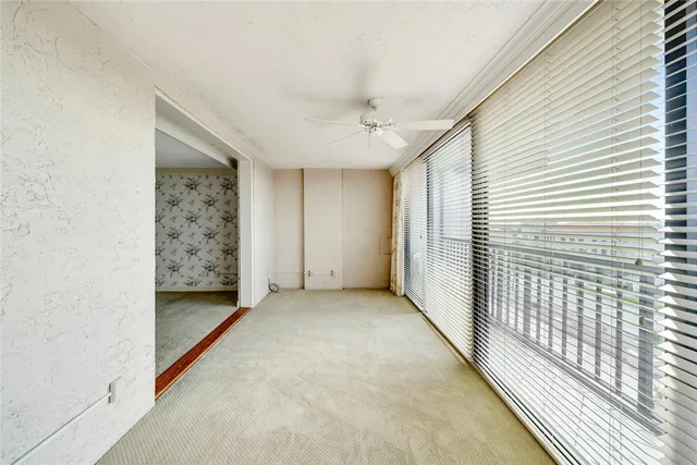 a utility room with cabinets washer and dryer