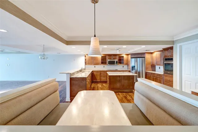 a view of kitchen with furniture and window