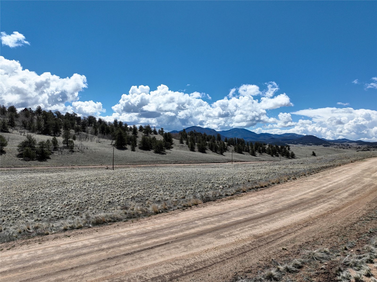114 Eagle Rock Road Jefferson, CO 80456 - Photo 4 of 16 View of mountain background featuring rural landscape