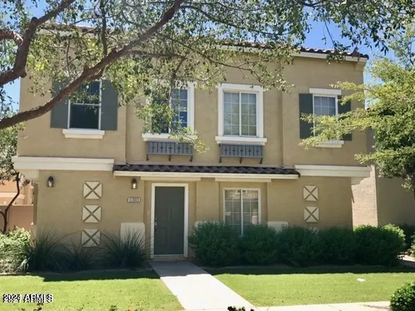 a view of a house with a swimming pool