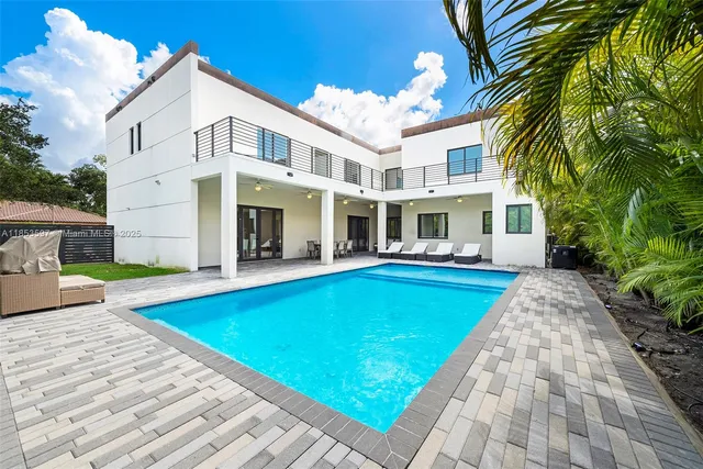 a living room with a couch and a flat screen tv