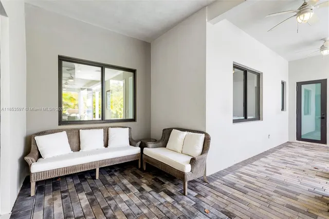 a bedroom with a bed and a tv