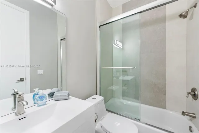 a swimming pool with outdoor seating and yard