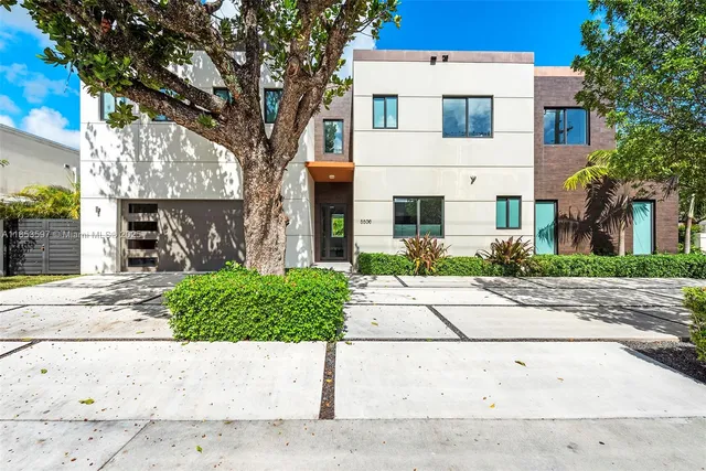 a view of an house with backyard porch and patio