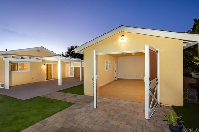 a view of a house with a swimming pool