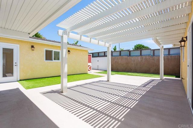 a house with garden in front of it