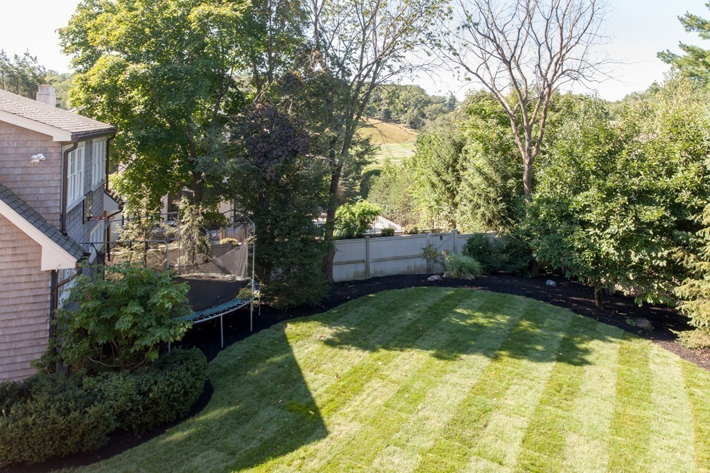 86 Pickwick Road Newton, MA 02465 - Photo 16 of 16 a backyard with tall trees