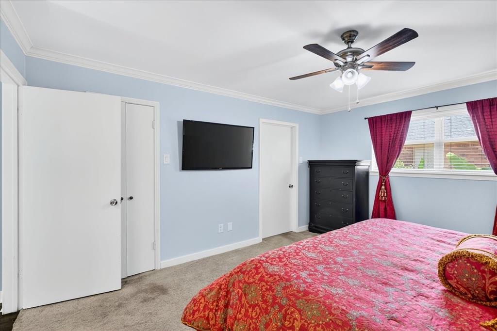 114 Baker B Ranch Road Trinidad, TX 75163 - Photo 13 of 25 a bedroom with a bed and a flat screen tv