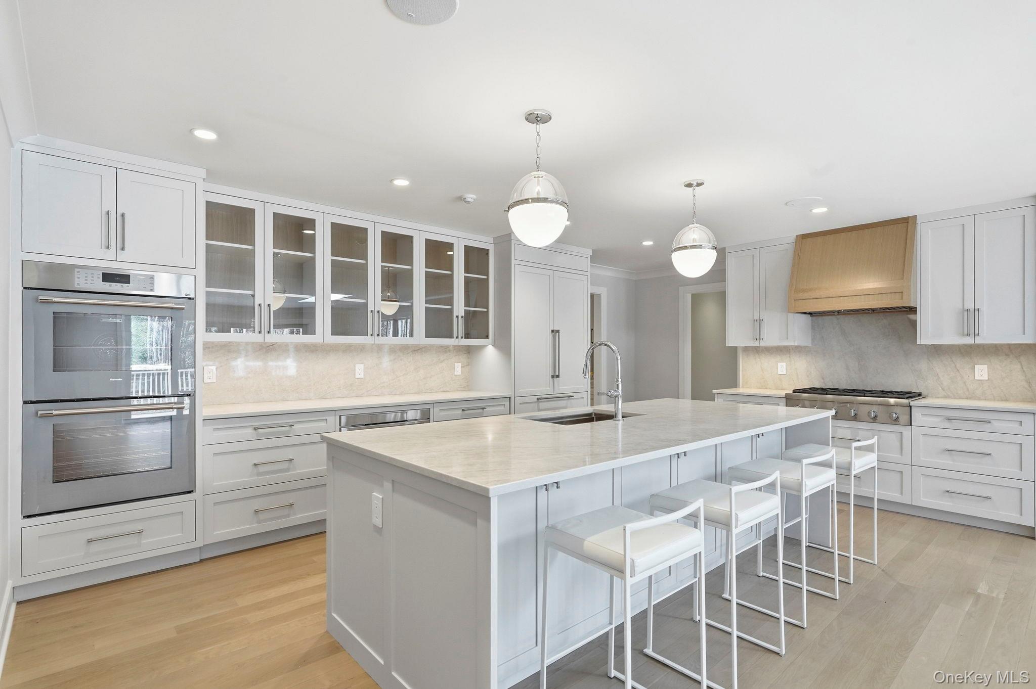 39 A Barlow Lane Rye, NY 10580 - Photo 12 of 48 Chef's Kitchen with Island and Top-Tier Appliances