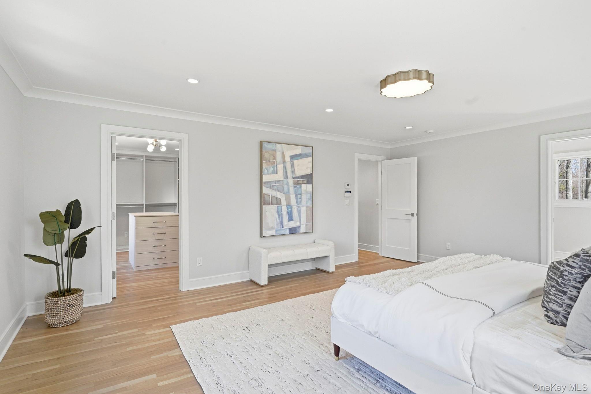 39 A Barlow Lane Rye, NY 10580 - Photo 19 of 43 Primary Bedroom with Large Walk-In Closet and Ensuite Bath