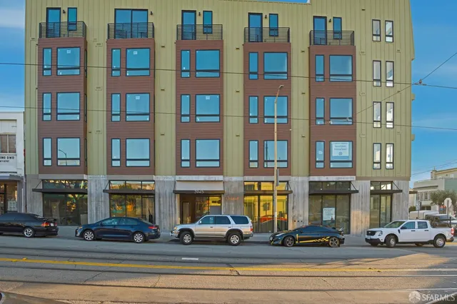 a view of a building along the road