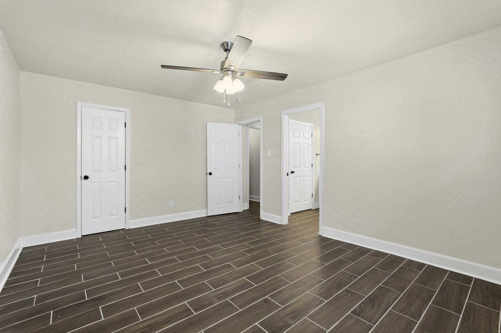 2518 Henderson Lane Deer Park, TX 77536 - Photo 18 of 28 a view of an empty room with wooden floor