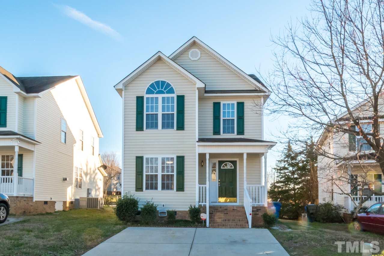 4312 Windlass Court Raleigh, NC 27616 - Photo 1 of 22 a front view of a house with garden