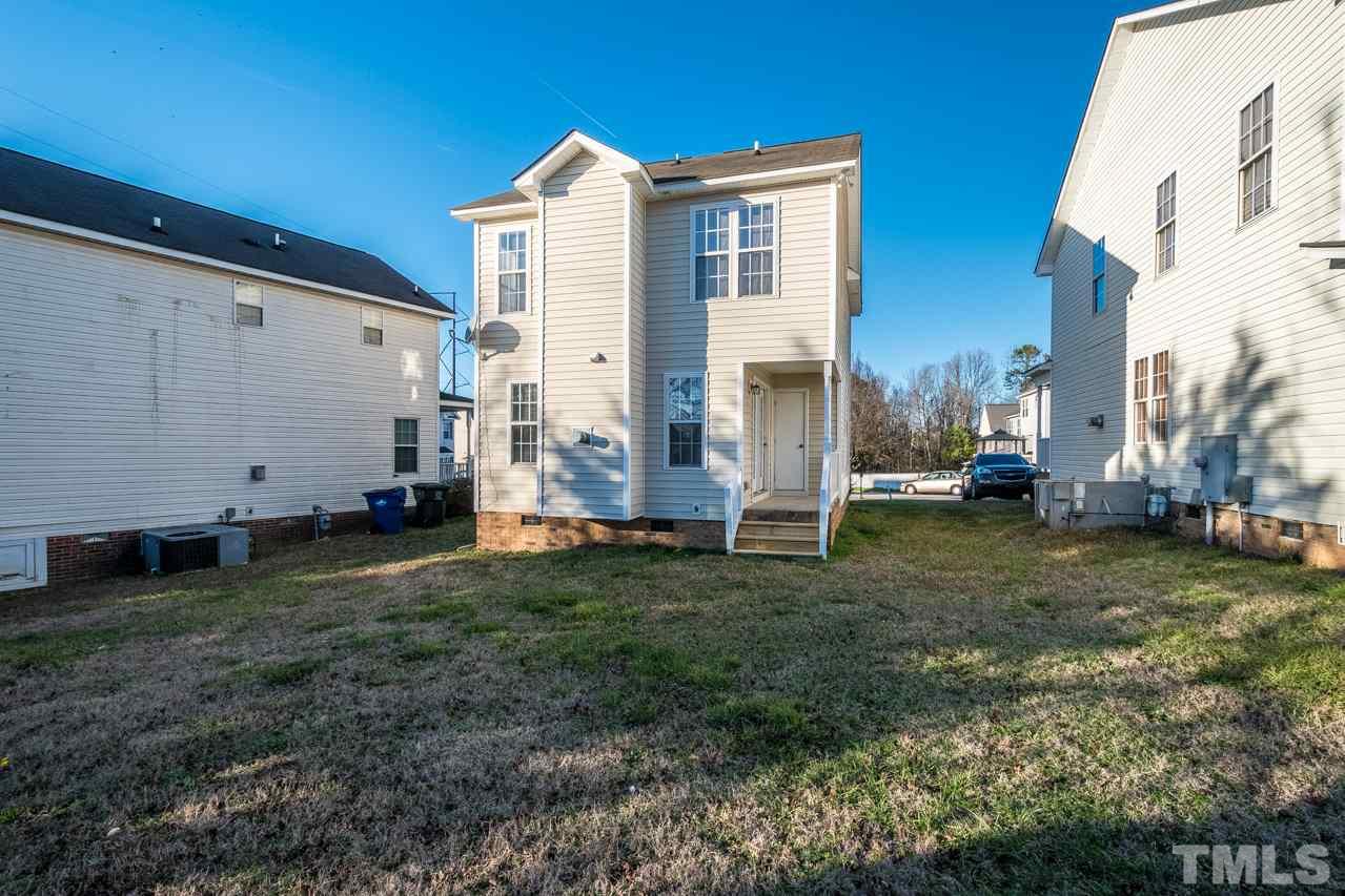 4312 Windlass Court Raleigh, NC 27616 - Photo 19 of 22 a view of a back yard of the house