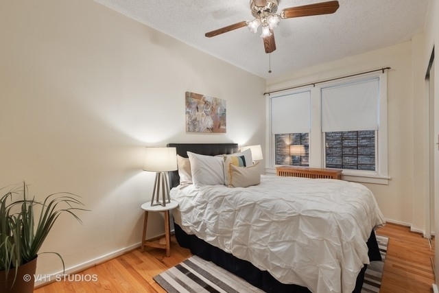 647 West Sheridan Road, Unit 1E Chicago, IL 60613 - Photo 14 of 17 a bedroom with a bed and window