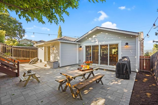 a view of a terrace with sitting area