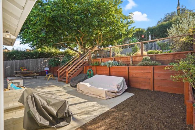 a garden view with a seating space