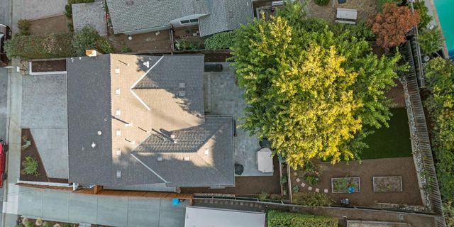 a front view of a house with parking