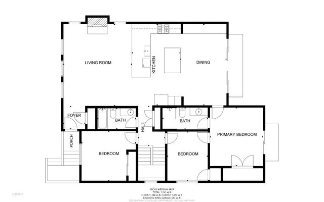 a view of a palm tree in front of a building