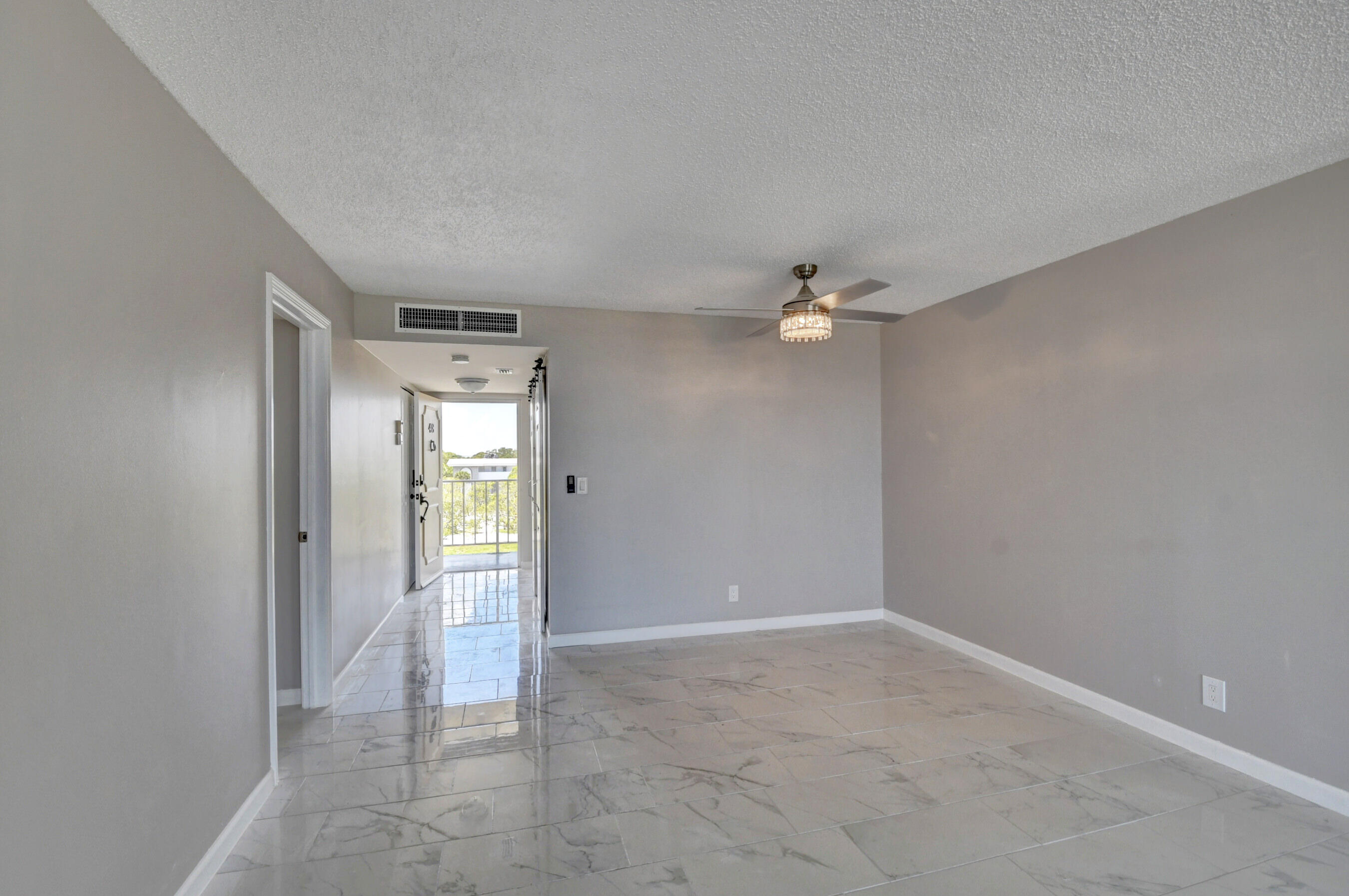 5500 Northwest 2nd Avenue, Unit 418 Boca Raton, FL 33487 - Photo 20 of 43 a view of an empty room with a fan