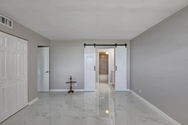 a view of a livingroom and a mirror
