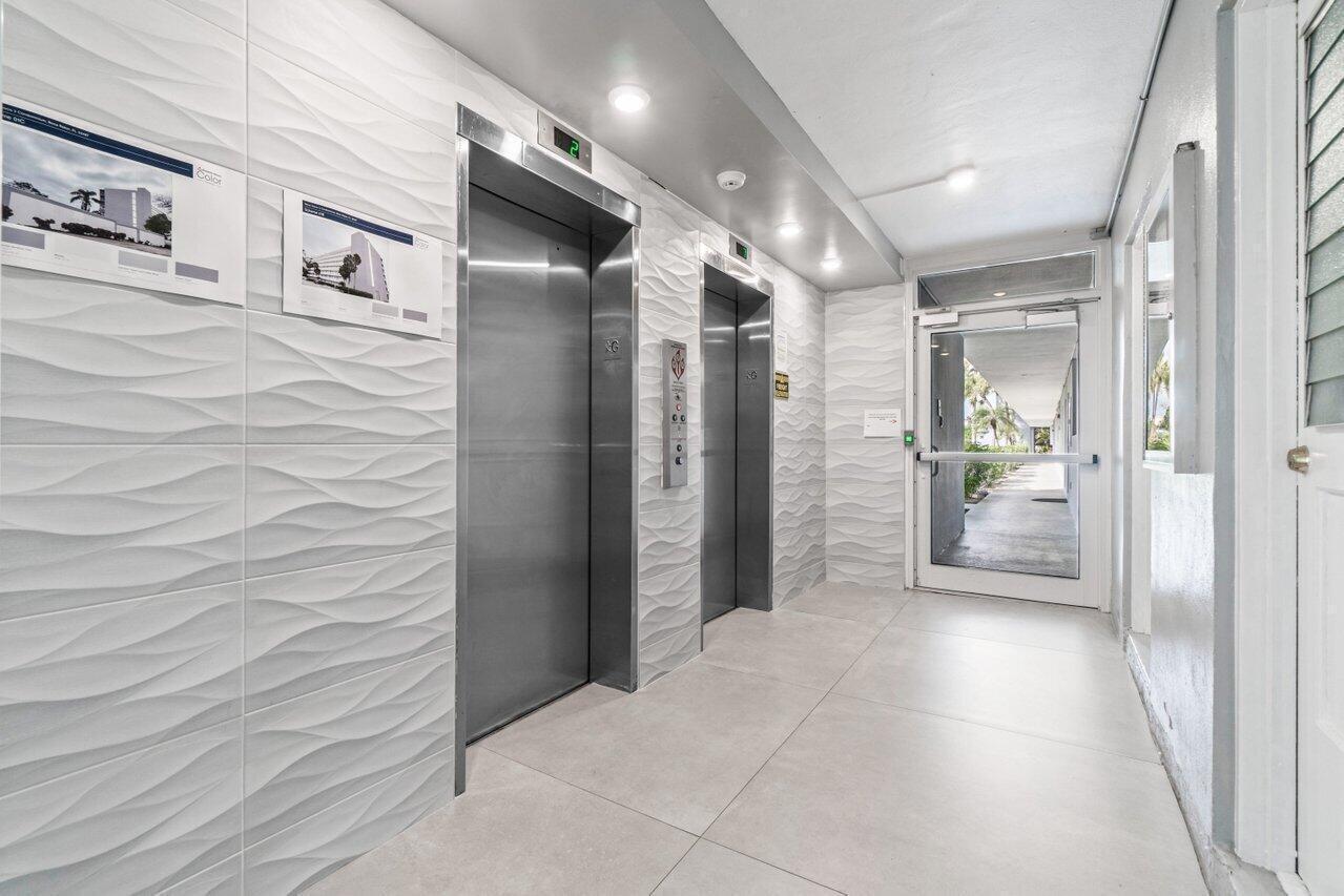 5500 Northwest 2nd Avenue, Unit 418 Boca Raton, FL 33487 - Photo 4 of 43 a bathroom with a shower and a sink