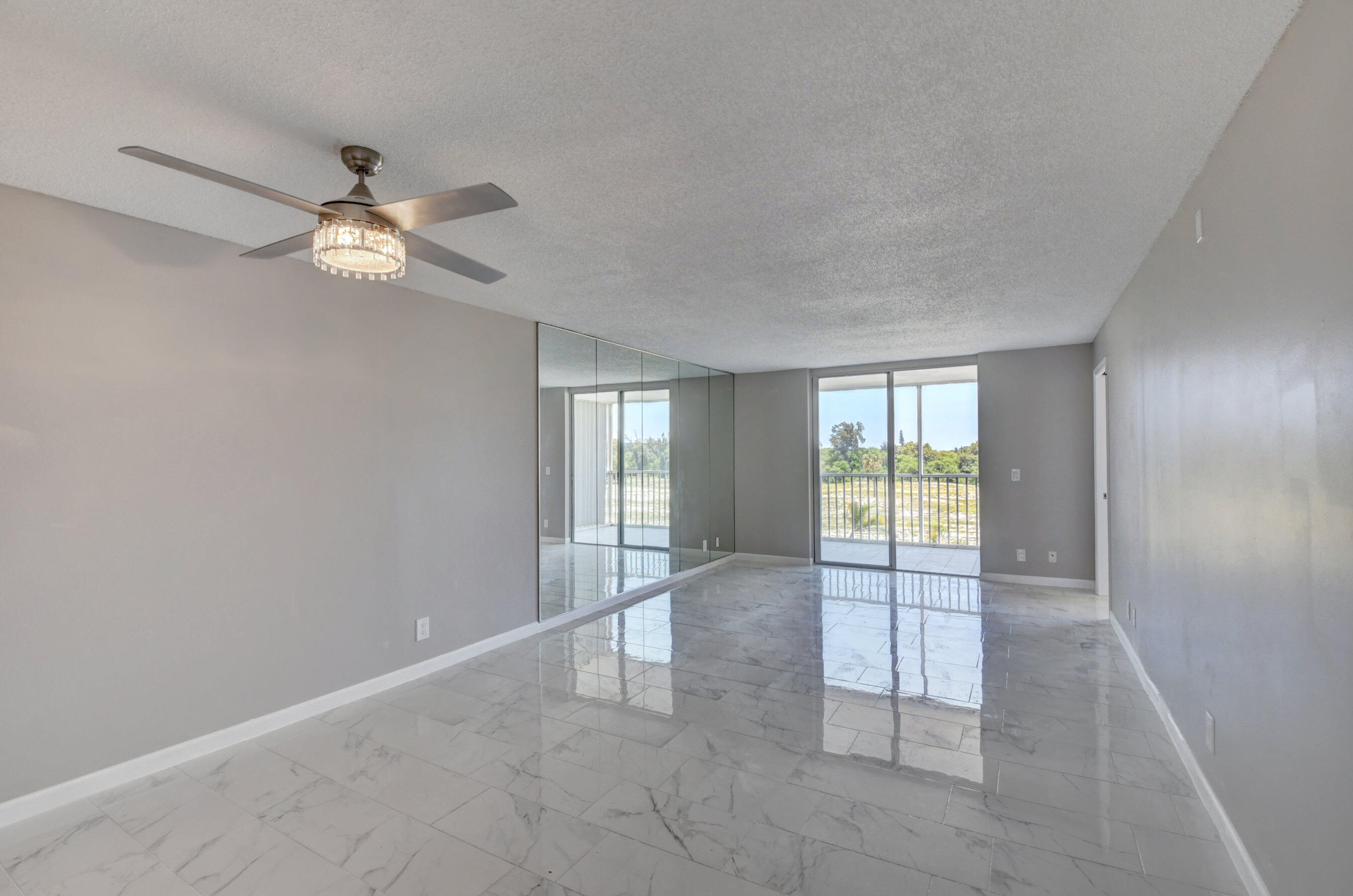 5500 Northwest 2nd Avenue, Unit 418 Boca Raton, FL 33487 - Photo 7 of 43 a view of an empty room with a window