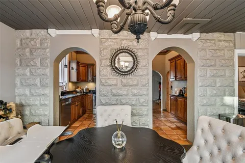 a view of a backyard with sitting area