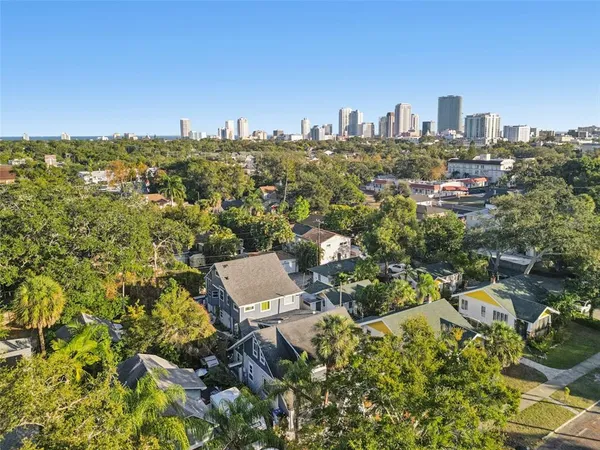 an aerial view of a city with lots of residential buildings
