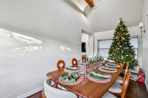 a kitchen with stainless steel appliances granite countertop a refrigerator a sink a stove and dishwasher