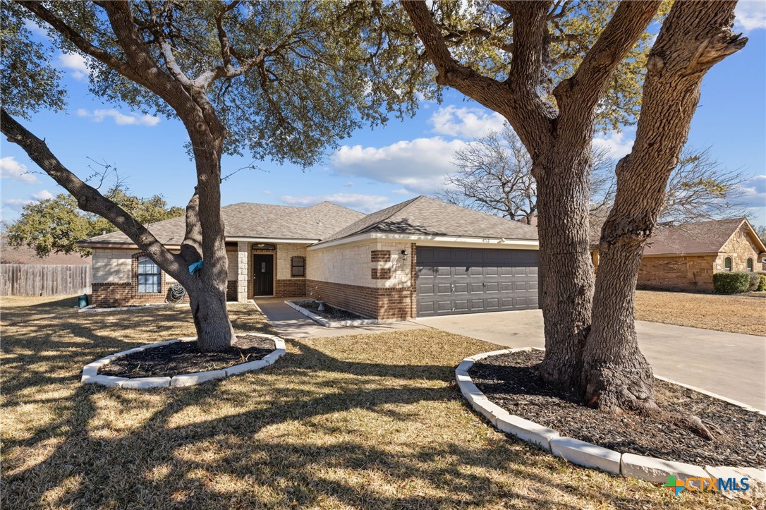 4712 Ramhorn Killeen, TX 76542 - Photo 1 of 27 a view of a house with snow on the tree