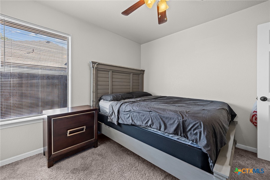 4712 Ramhorn Killeen, TX 76542 - Photo 22 of 27 a bedroom with a bed and a window