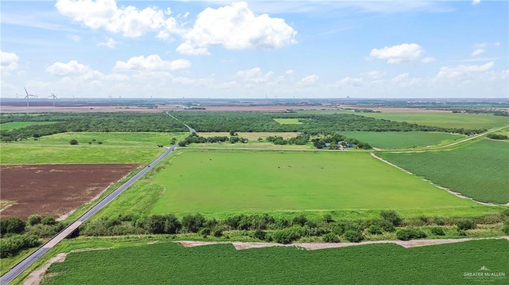 0 Fm 506 Highway Santa Rosa, TX 78593 - Photo 5 of 7 Expansive agricultural landscape featuring multiple cultivated fields and scattered tree lines