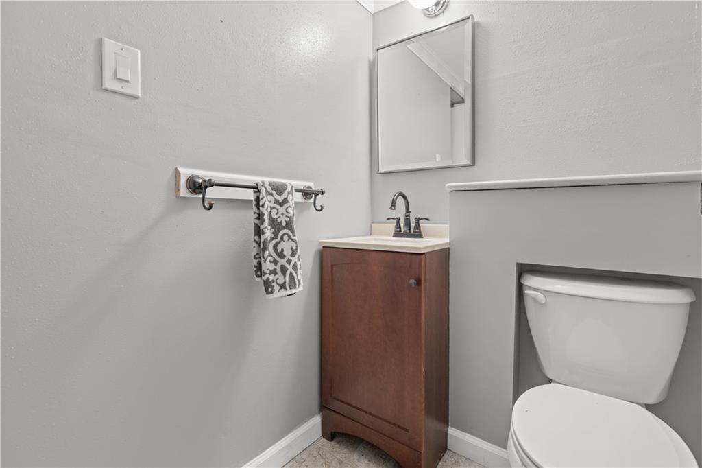 109 Raleigh Court Pittsburgh, PA 15237 - Photo 19 of 21 a bathroom with a toilet sink and mirror