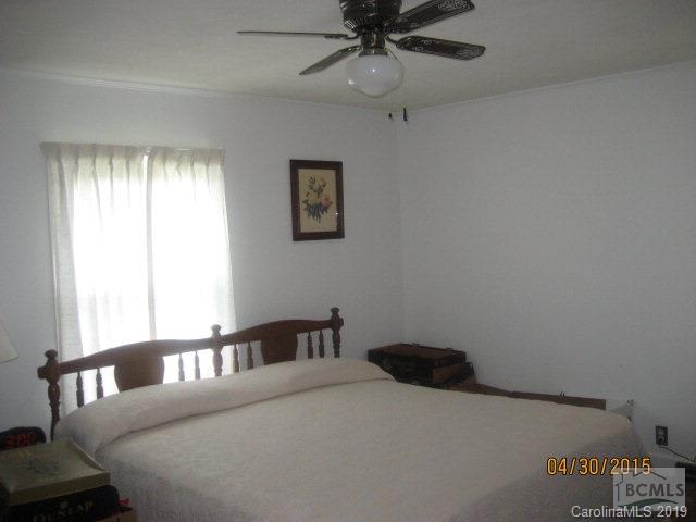 2419 Byrd Road Morganton, NC 28655 - Photo 8 of 19 a bedroom with a bed and a window