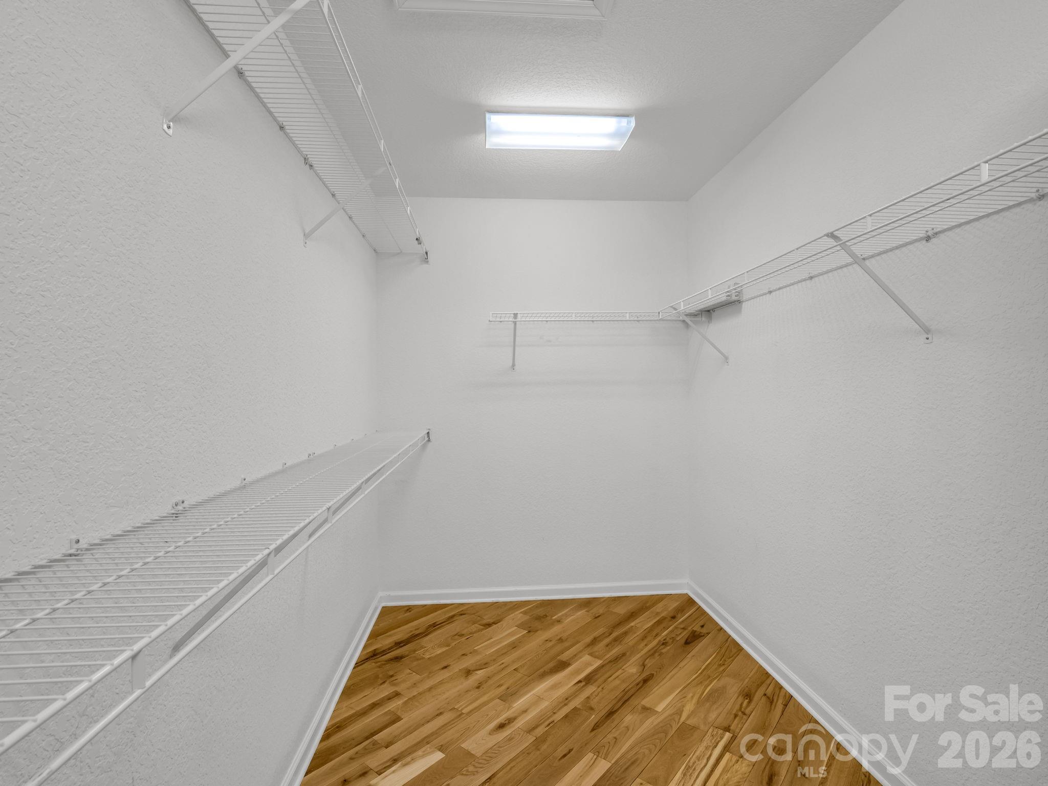 4 Rathfarnham Road, Unit 4F Asheville, NC 28803 - Photo 30 of 33 a view of a room with racks on the wall